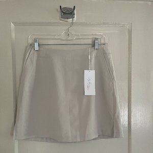 Lady Hagen, light beige HydroDri golf skort.  Size 4, NWT